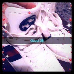 Gucci white hightop authentic sneaker .
